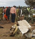 Rescue personnel work at the crash site of an ATR-72 turboprop plane, in Laos, near Pakse