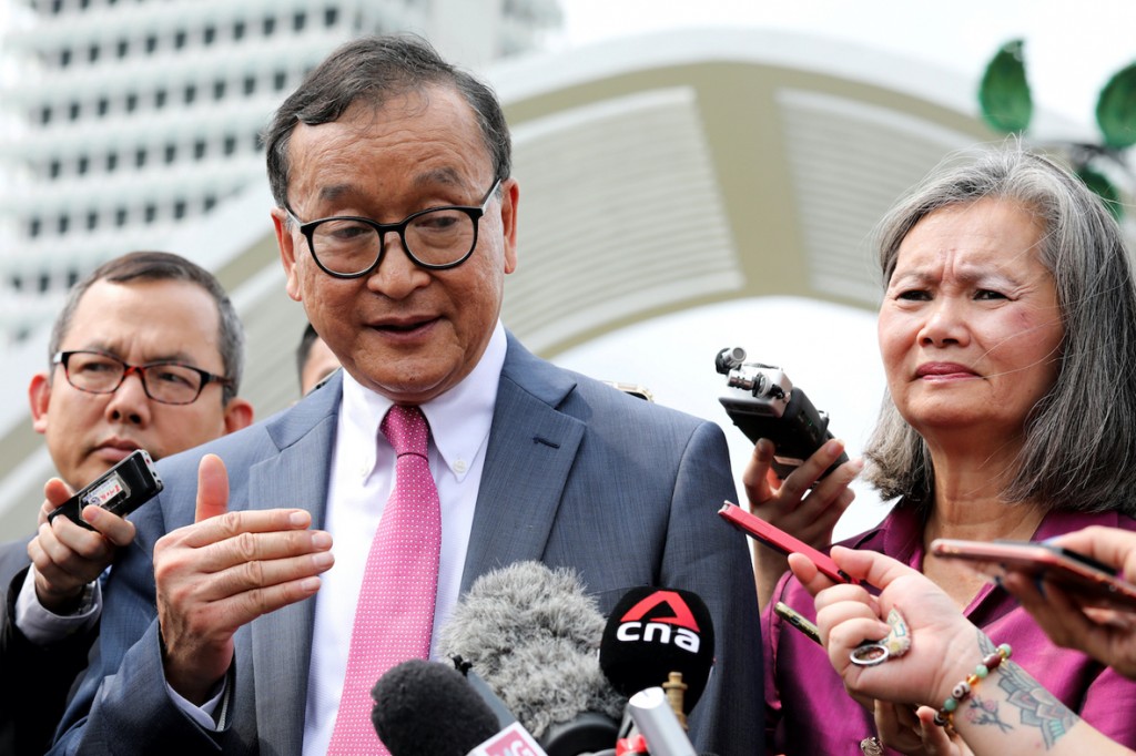 FILE PHOTO: Self-exiled Cambodian opposition party founder Sam Rainsy and Mu Sochua, Deputy President of the Cambodia National Rescue Party (CNRP), speak to members of the media in Kuala Lumpur