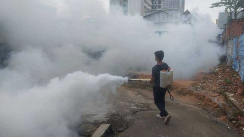 a_health_worker_sprays_anti-mosquito_pesticides_on_september_16._moh
